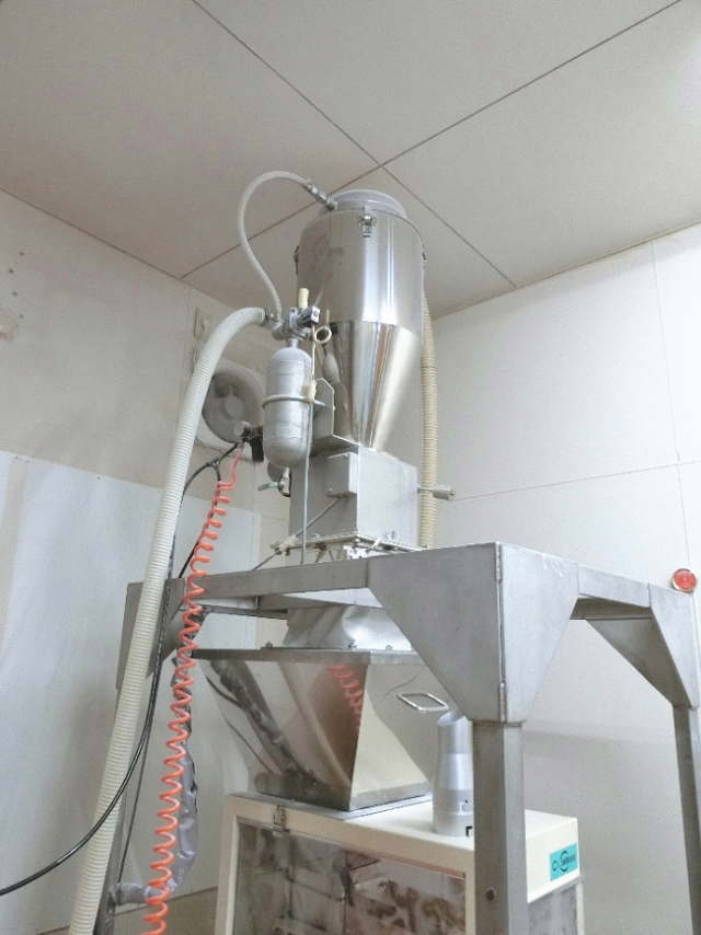 フィーダー式計量機 粉体用風送装置